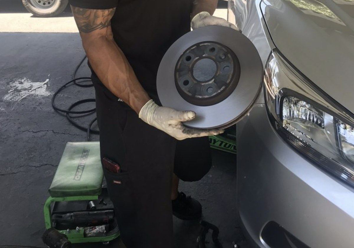 New rotor checked before installation at a Wichita brake job